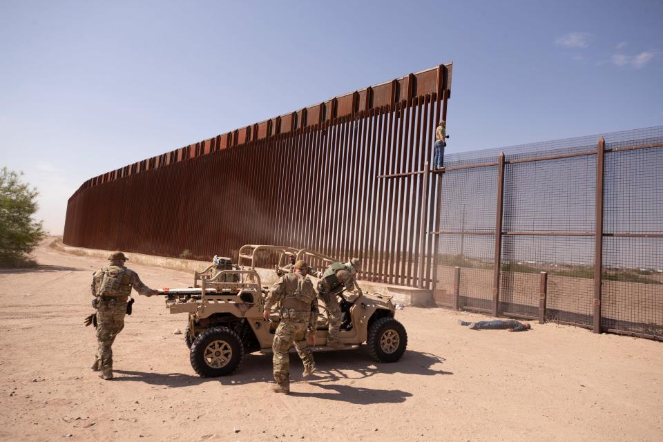 Border Patrol Search, Trauma, and Rescue simulate a rescue of a victim who would have fallen from the border wall during a demonstration in El Paso, Texas, on May 2.