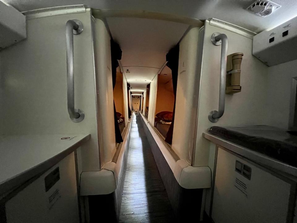 Qatar's Boeing 777-200LR flight attendant crew rest area.