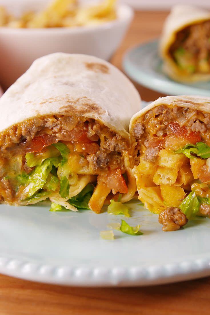 <p>Cheeseburgers and burritos aren't foods you'd usually think of eating together, but we thought it was way overdue to combine both (including the fries!) And let's just say, these burritos are (no surprise!) crazy delicious. </p><p>Get the <strong><a href="https://www.delish.com/cooking/recipe-ideas/recipes/a51674/burgerritos-recipe/" rel="nofollow noopener" target="_blank" data-ylk="slk:Burgerritos recipe;elm:context_link;itc:0;sec:content-canvas" class="link ">Burgerritos recipe</a></strong>. </p>