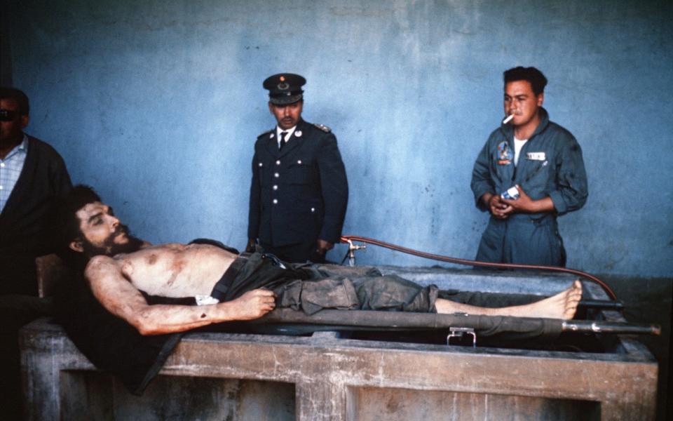 Che Guevara's body on public display in Vallegrande, Bolivia - MARC HUTTEN/AFP via Getty Images