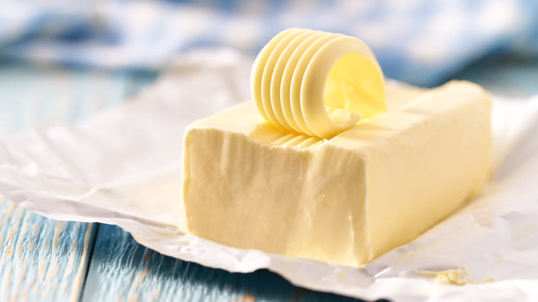 Butter on a blue table 
