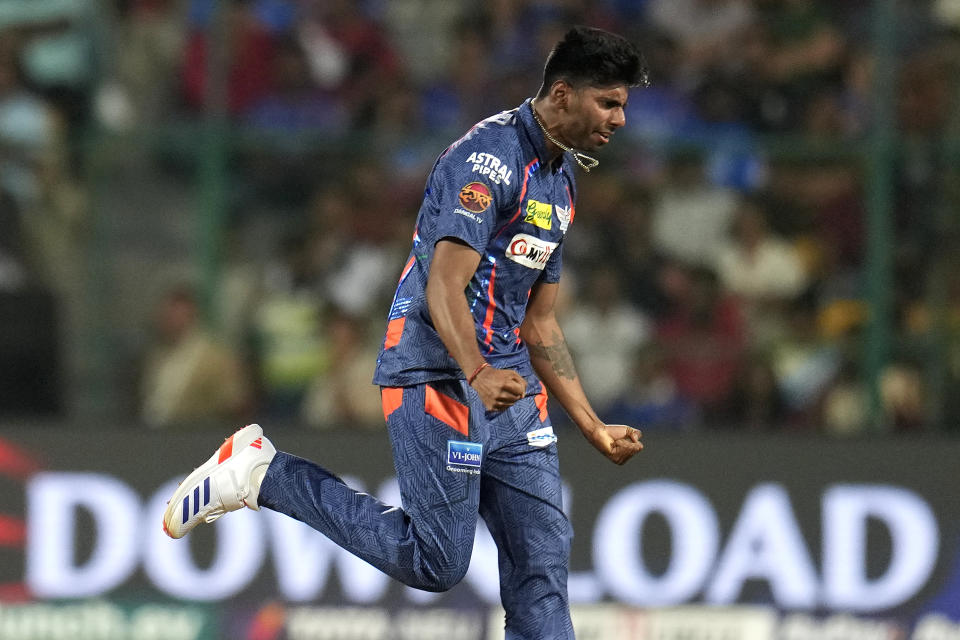 Lucknow Super Giants' Mayank Yadav celebrates the dismissal of Royal Challengers Bengaluru's Cameron Green during the Indian Premier League cricket match between Royal Challengers Bengaluru and Lucknow Super Giants in Bengaluru, India, Tuesday, April 2, 2024. (AP Photo/Aijaz Rahi)