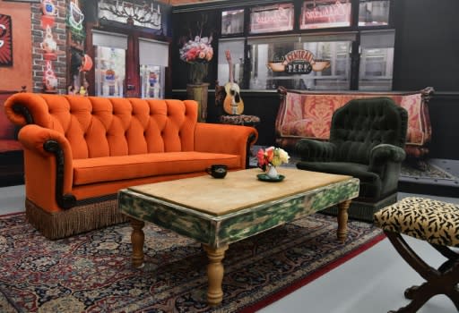 The famous orange sofa where the cast of 'Friends' used to sit in Central Perk. On display as part of an exhibition in New York marking the 25th anniversary of the sitcom