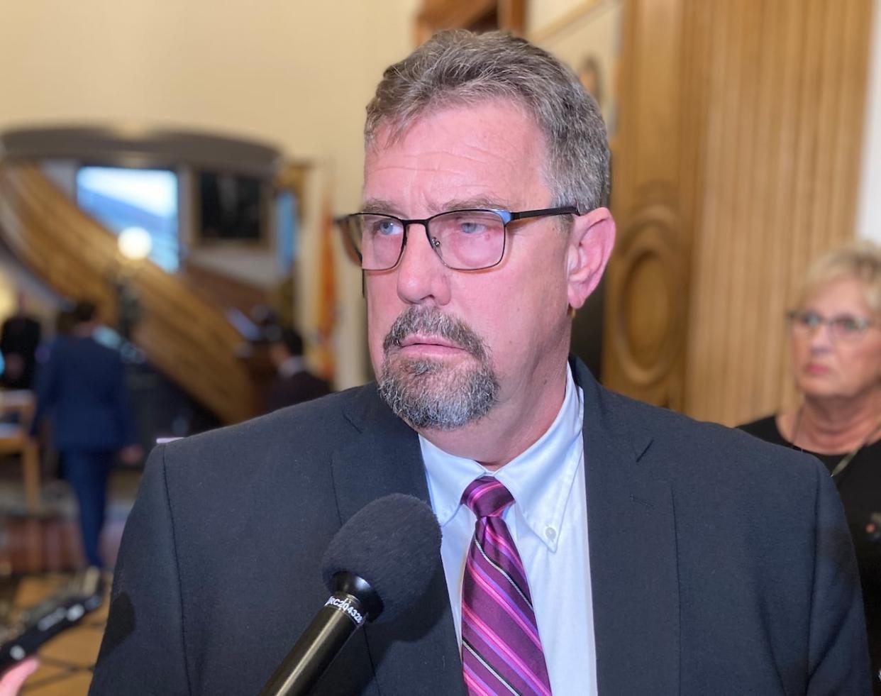 Last June, Education Minister Bill Hogan changed Policy 713 to make it mandatory to get parental consent before school staff use a child's chosen name and pronoun, if the child is under 16.   (Jacques Poitras/CBC - image credit)