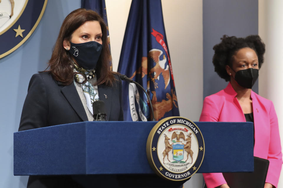 In a photo provided by the Michigan Office of the Governor, Michigan Gov. Gretchen Whitmer addresses the state during a speech, Wednesday, April 14, 2021, in Lansing, Mich. The governor provided an update on COVID-19 cases, vaccines and variants and discussed the state's efforts to expand the use of monoclonal antibody therapy to help those diagnosed with COVID-19 avoid hospitalization. (Michigan Office of the Governor via AP)