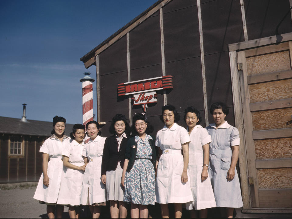 <p>Japanese-American camp, Tule Lake Relocation Center, California 1942/1943. Eight Japanese women standing outside the barber’s shop in the U.S. war emergency evacuation camp set up in World War II. (Universal History Archive/Getty Images) </p>