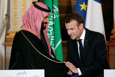 French President Emmanuel Macron and Saudi Arabia's Crown Prince Mohammed bin Salman attend a press conference at the Elysee Palace in Paris, France, April 10, 2018. Yoan Valat/Pool via Reuters