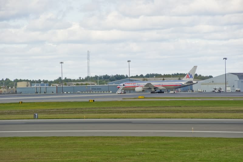 An American Airlines receives attention from Bangor staff after a diversion