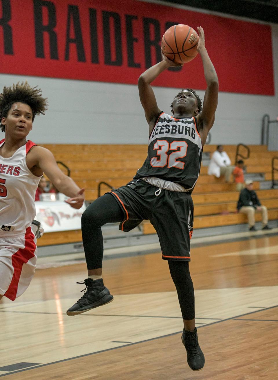 Leesburg's Sydney Little (32) shoots during Thursday's game against South Sumter in Bushnell. Little finished with 8 points in the Yellow Jackets' 31-22 victory. [PAUL RYAN / CORRESPONDENT]