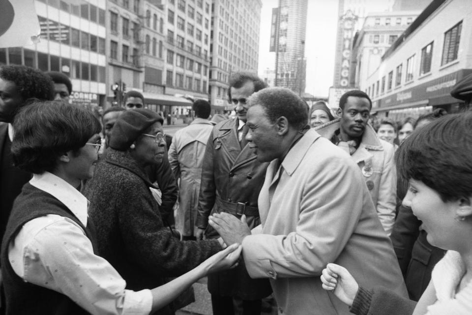 Harold Washington campaigning along Chicago's State Street.