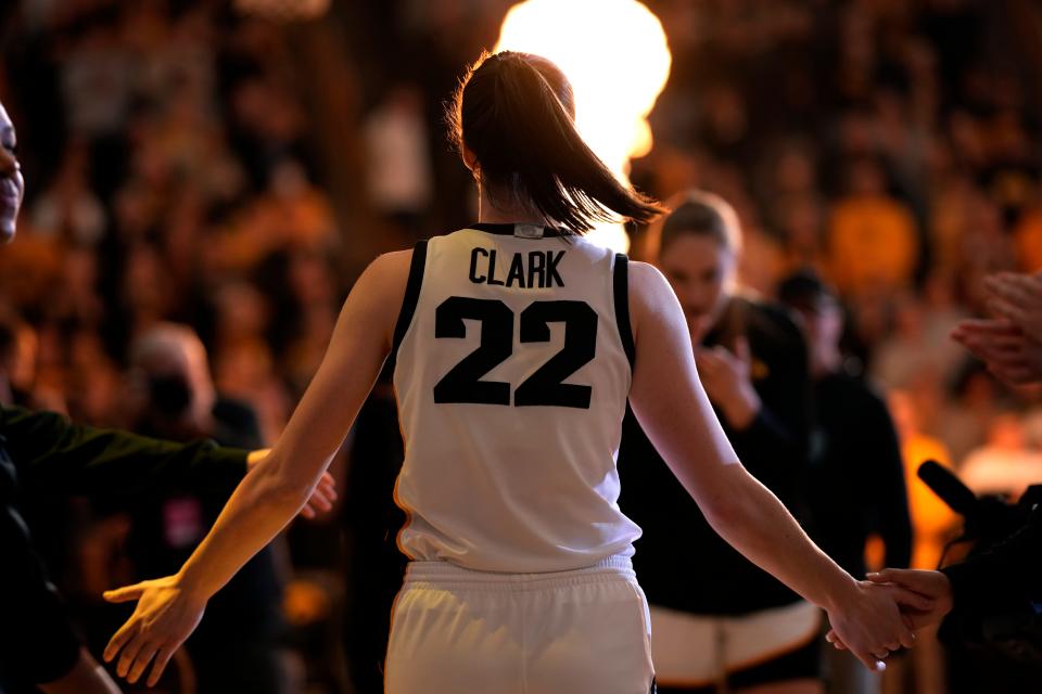 Iowa's Caitlin Clark went through senior-day ceremonies, although she has the option to return to college for a fifth season.