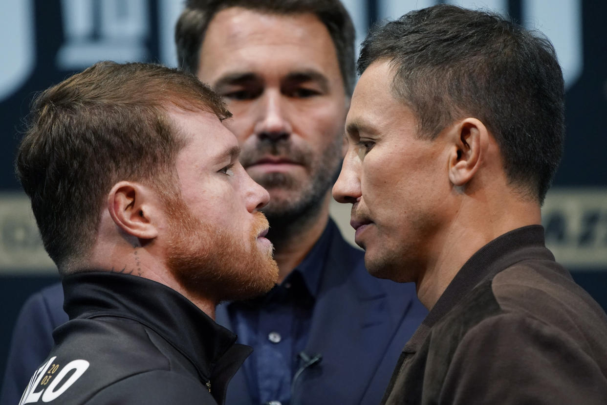 Canelo Alvarez, left, and Gennady Golovkin, right, pose during a news conference Thursday, Sept. 15, 2022, in Las Vegas. The two are scheduled to fight in a super middleweight title bout Saturday in Las Vegas. (AP Photo/John Locher)