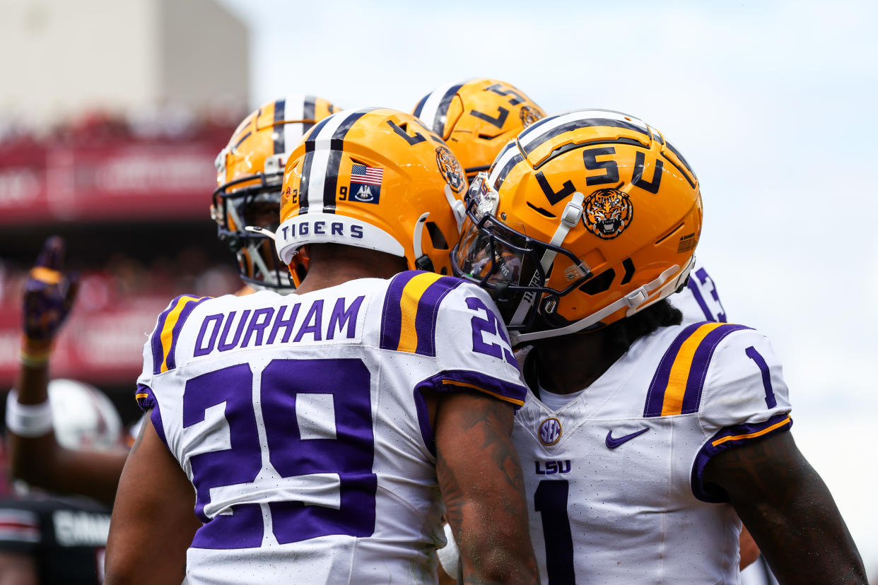 LSU running back Caden Durham celebrates one of his two touchdowns against South Carolina on Saturday. (Isaiah Vazquez/Getty Images)