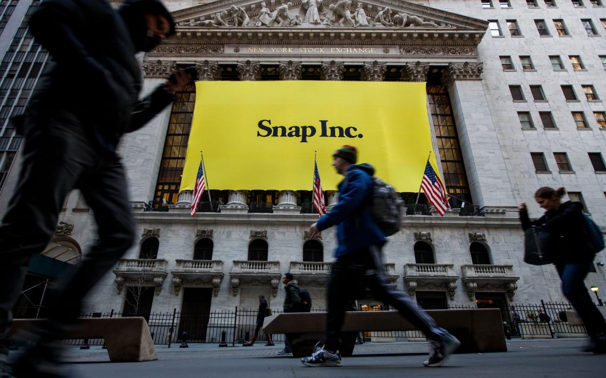 Signage for Snap Inc., parent company of Snapchat, adorns the front of the New York Stock Exchange (NYSE), March 2, 2017 in New York City - Drew Angerer/Getty