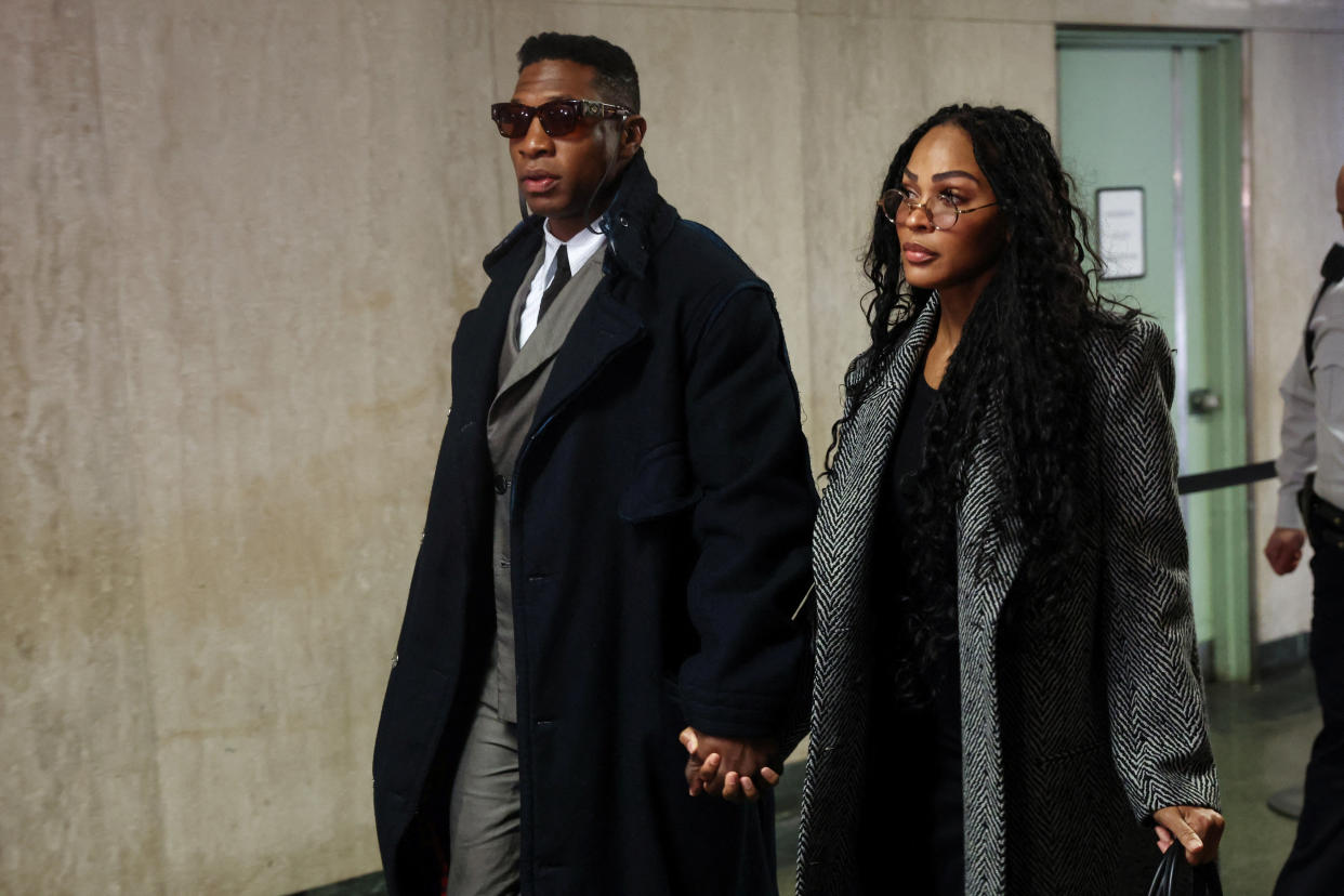 Actor Jonathan Majors arrives with Meagan Good for the jury selection in his assault and harassment case at Manhattan Criminal Court in New York City, U.S., November 29, 2023. REUTERS/Shannon Stapleton