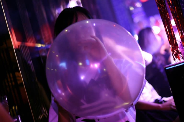 Ultra-popular "funky balloons" filled with laughing gas offer a legal route to a quick high