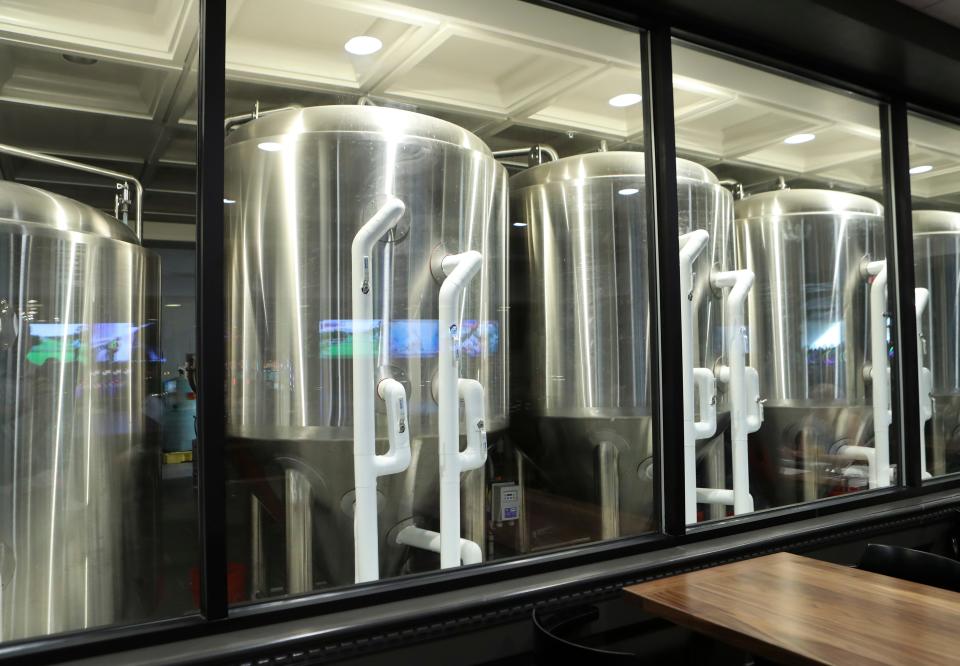 Fermentation vessels are on display at Delaware Park's new 1937 Brewing Co., which combines on-site craft brews and tap house food.