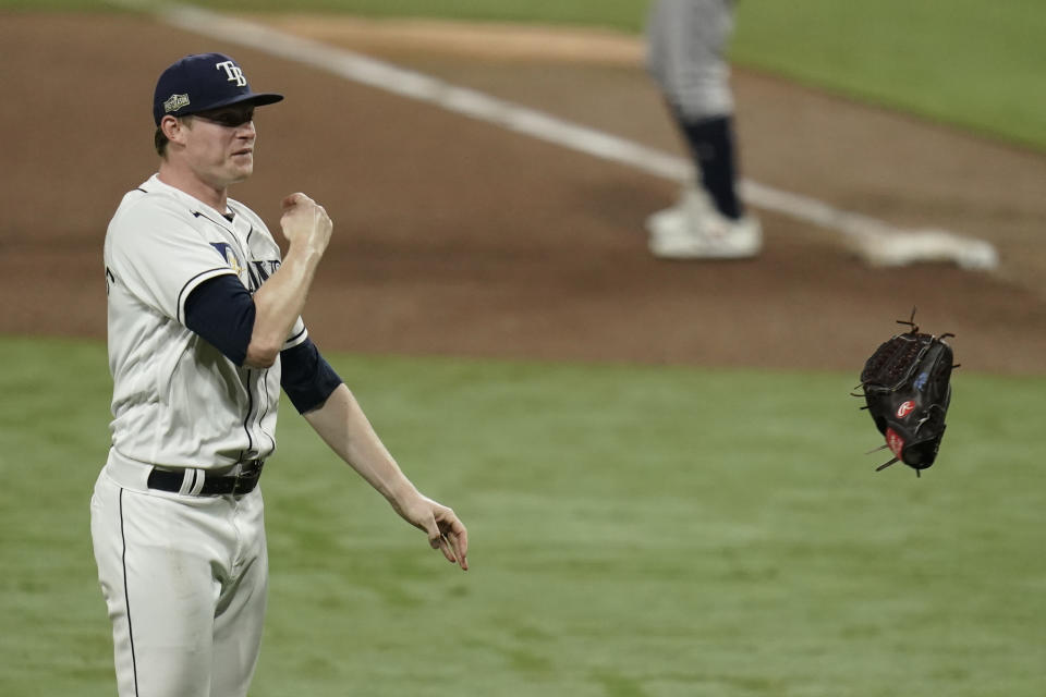 Tampa Bay Rays pitcher Peter Fairbanks celebrates their victory against the Houston Astros in Game 7 of a baseball American League Championship Series, Saturday, Oct. 17, 2020, in San Diego. The Rays defeated the Astros 4-2 to win the series 4-3 games. (AP Photo/Gregory Bull)
