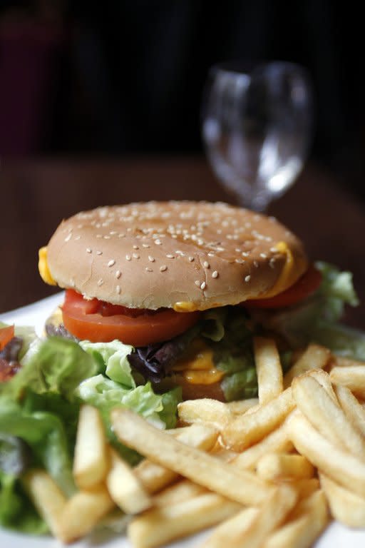 A hamburger and French fries in a restaurant in Paris