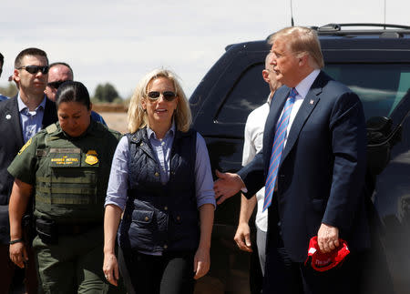 Homeland Security Secretary Kirstjen Nielsen and U.S. President Donald Trump arrive to view a section of border wall in Calexico California, U.S., April 5, 2019. REUTERS/Kevin Lamarque