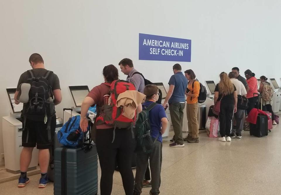 Passengers at Charlotte Douglas Airport. The airport expects to see record travel over the summer