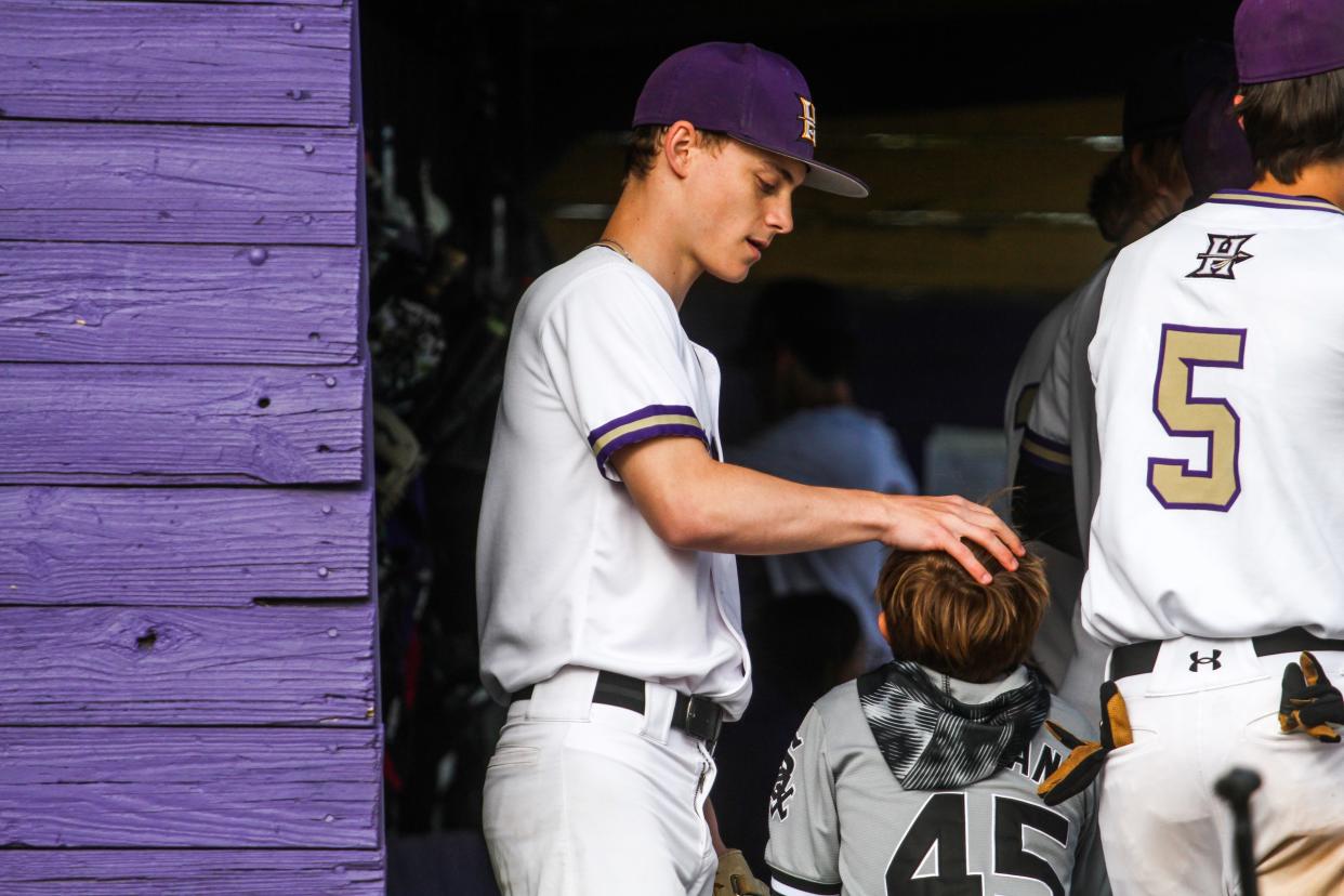 Hallsville baseball player Brayden Nichols (3) steps into the dugout during a baseball game between Tolton and Hallsville on Friday, April 19, 2024, in Hallsville.