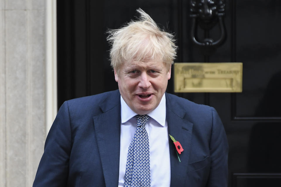 Britain's Prime Minister Boris Johnson leaves 10 Downing Street, in London, Thursday, Oct. 31, 2019. Prime Minister Boris Johnson sought the Dec. 12 election to break the parliamentary deadlock over Britain's plans to withdraw from the European Union. Johnson blames Corbyn for blocking his Brexit deal and says a Labour victory would lead to further delay. (AP Photo/Alberto Pezzali)