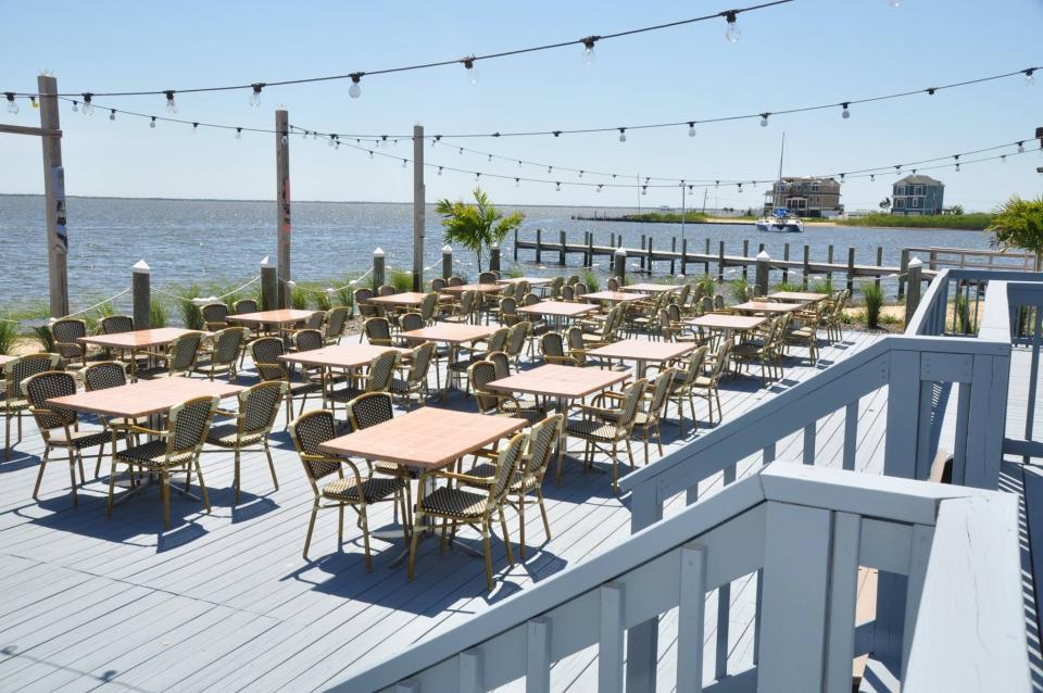 The deck ak at MJ's Restaurant, Bar & Grill overlooks a cove off Barnegat Bay.