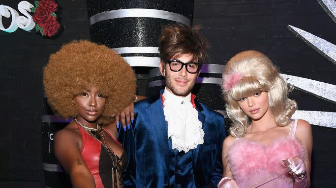 trio halloween costumes foxxy cleopatra austin powers and a fembot from 'austin powers in goldmember'