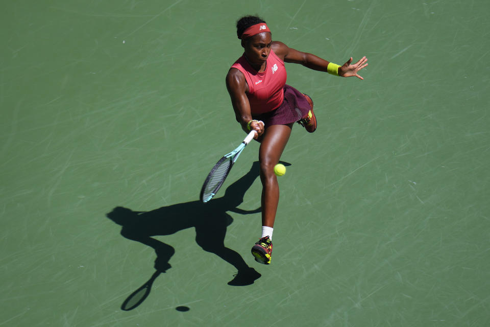 Coco Gauff, of the United States, returns a shot to Jelena Ostapenko, of Latvia, during the quarterfinals of the U.S. Open tennis championships, Tuesday, Sept. 5, 2023, in New York. (AP Photo/Manu Fernandez)