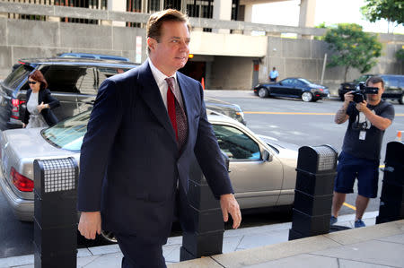 FILE PHOTO: Former Trump campaign chairman Paul Manafort arrives for arraignment on a third superseding indictment against him by Special Counsel Robert Mueller on charges of witness tampering, at U.S. District Court in Washington, U.S., June 15, 2018. REUTERS/Jonathan Ernst/File Photo