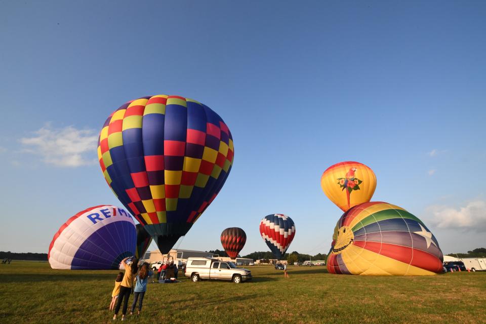The first Balloons over Sussex drew in 8,000 visitors on Saturday, Sept. 14 and Sunday, Sept. 15, 2019 near Delaware Coastal Business Airport in Georgetown. Songs like "Fly Me to the Moon" and "Slow Ride" cheekily clung to the sky as 11 hot air balloons took flight. Folks could also hop in one of the four tethered balloons for a vertically shorter ride. Those who wished to stay earthbound could step inside a balloon and reminisce of the giant parachutes from middle school gym.