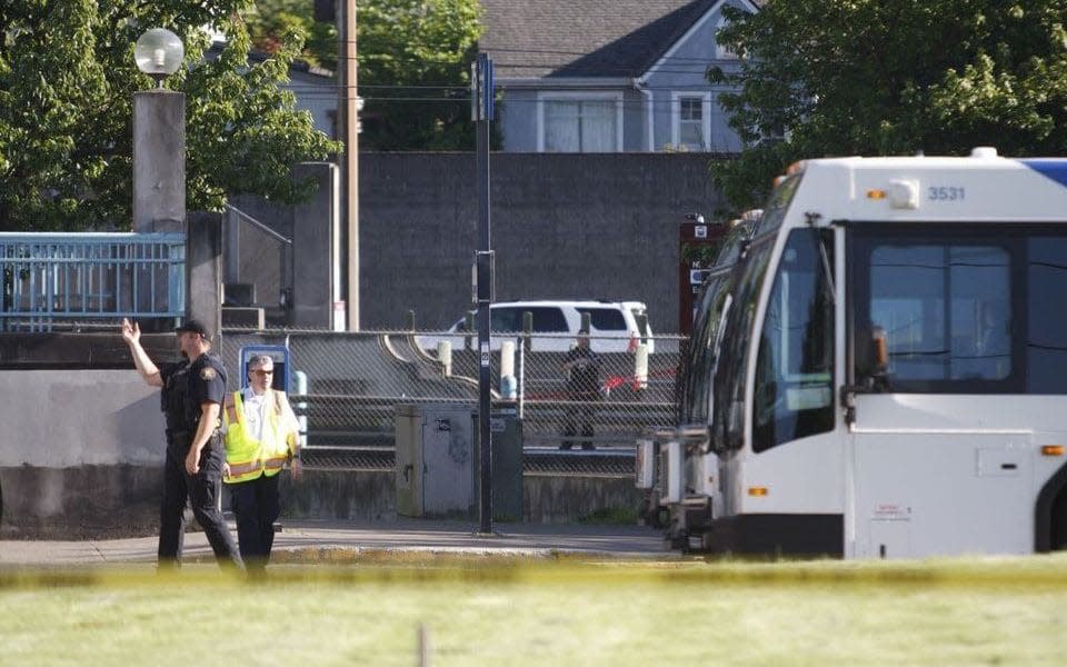 Two men were killed after intervening in racist abuse aimed at Muslim women at a tram station in Portland, Oregon. - Credit: Jim Ryan, The Oregonian/AP