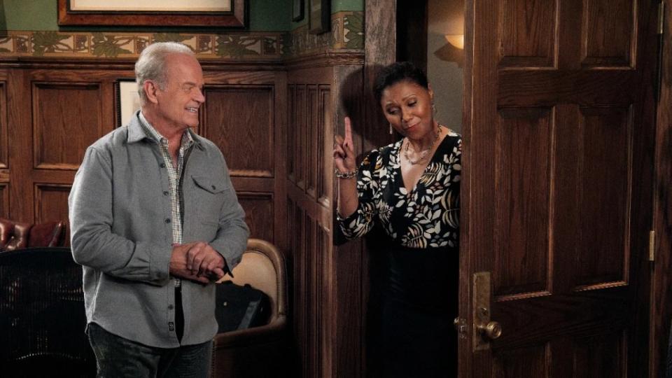 Kelsey Grammer as Frasier Crane and Toks Olagundoye as Olivia In Frasier