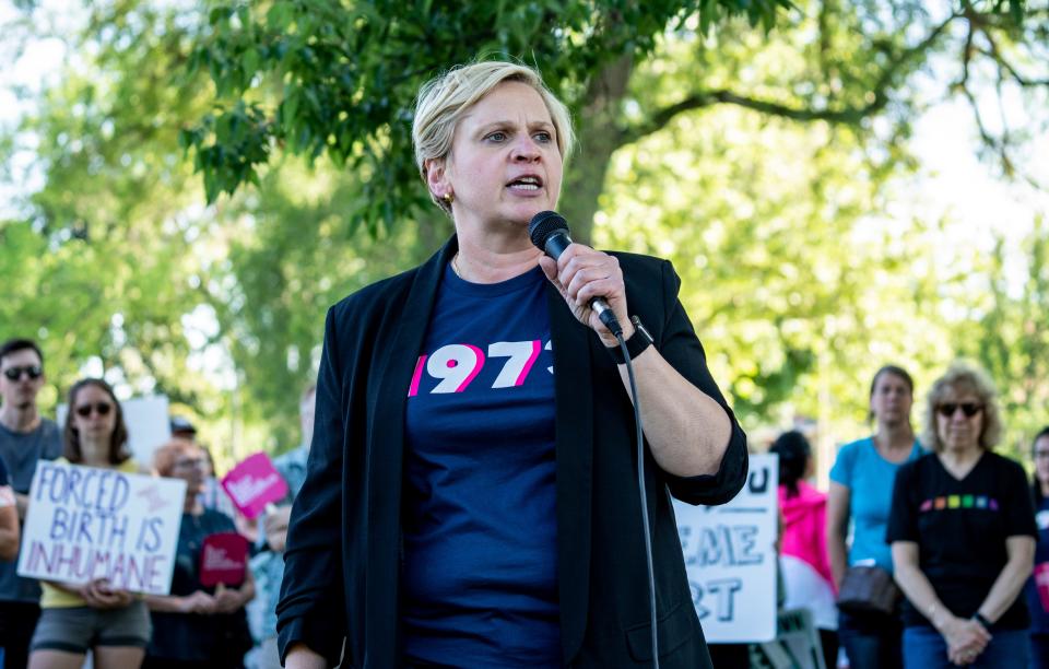 Tanya Atkinson, president of Planned Parenthood Advocates of Wisconsin, speaks at a rally in response to the Supreme Court's 6-3 decision to overturn the 1973 ruling that legalized abortion in the U.S. on June 24, 2022, at Humboldt Park in Milwaukee