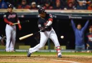 Oct 25, 2016; Cleveland, OH, USA; Cleveland Indians third baseman Jose Ramirez hits a double against the Chicago Cubs in the 6th inning in game one of the 2016 World Series at Progressive Field. Mandatory Credit: Tommy Gilligan-USA TODAY Sports