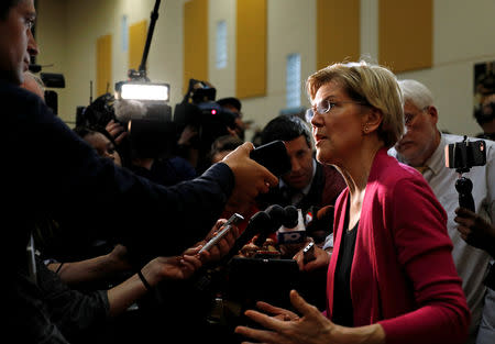 FILE PHOTO: Democratic 2020 U.S. presidential candidate and U.S. Senator Elizabeth Warren (D-MA) speaks to reporters during a townhall event in Columbus, Ohio, U.S., May 10, 2019. REUTERS/Maddie McGarvey/File Photo