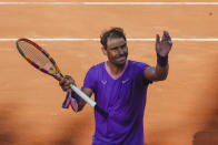 Spain's Rafael Nadal celebrates after beating Canada's Denis Shapovalov, in their 3rd round match at the Italian Open tennis tournament, in Rome, Thursday, May 13, 2021. Nadal won 6-3, 4-6, 6-7. (AP Photo/Alessandra Tarantino)