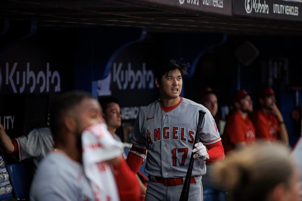 Los Angeles Angels designated hitter Shohei Ohtani returns to the dugout after being struck out against the Blue Jays in the first of a three-game series, in Toronto, on July 29, 2023.