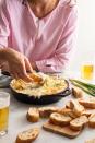 <p>It's the classy AF dip that'll slay your party.</p><p>Get the recipe from <a href="https://www.redbookmag.com/cooking/recipe-ideas/recipes/a49883/crab-artichoke-dip-recipe/" rel="nofollow noopener" target="_blank" data-ylk="slk:Delish;elm:context_link;itc:0;sec:content-canvas" class="link ">Delish</a>.</p>