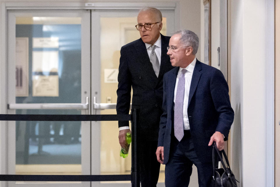 James Biden, brother of President Joe Biden, accompanied by Attorney Paul Fishman, right, arrives for a private interview with House Republicans at Thomas P. O'Neill House Office Building on Capitol Hill in Washington, Wednesday, Feb. 21, 2024. (AP Photo/Andrew Harnik)