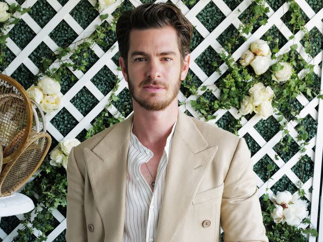 <p>Darren Gerrish/WireImage</p> Andrew Garfield attends the Ralph Lauren Suite during The Championships, Wimbledon 2022 on July 10, 2022 in London, England.