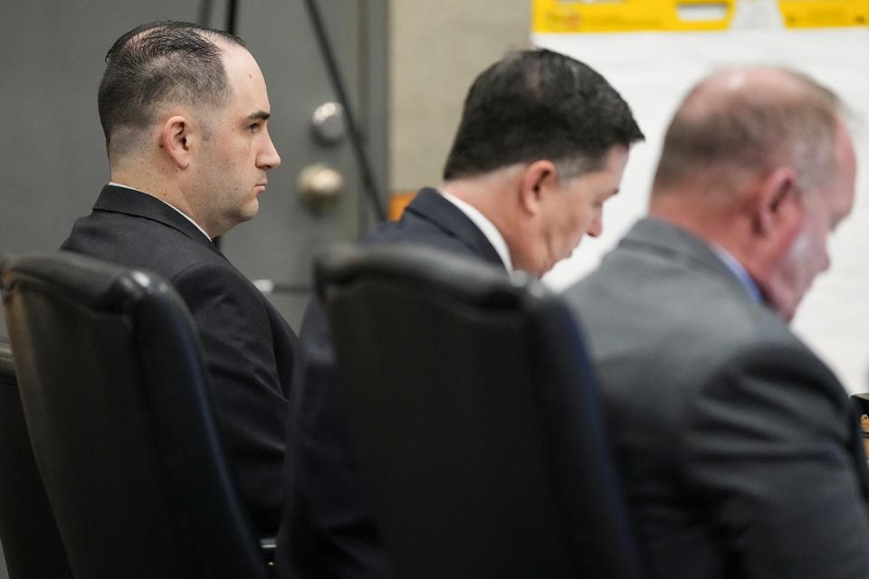 Defendant Daniel Perry sits with his attorneys during the first day of his trial Tuesday. Perry is charged with murder in the death of Garrett Foster, an Austin protester who was fatally shot on July 25, 2020.