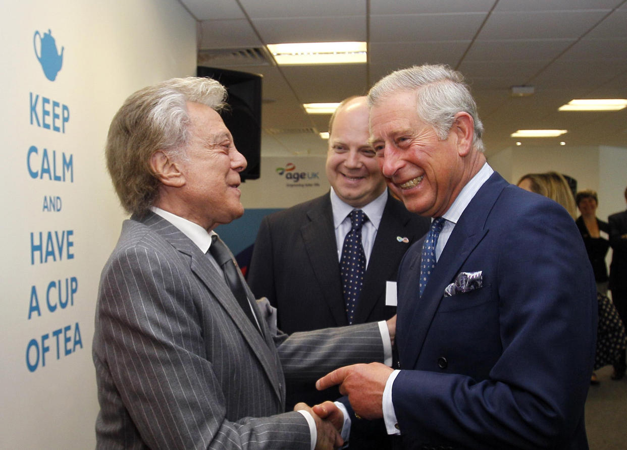 The Prince of Wales (right) meets actor and entertainer Lionel Blair at Tavis House in London.