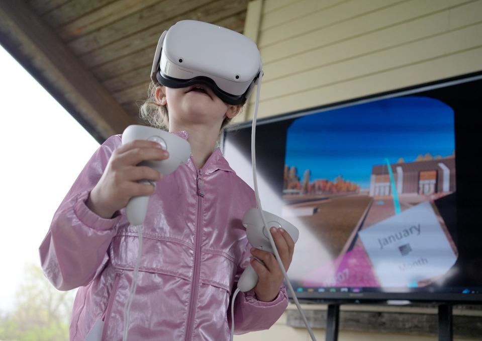 File photo: Paige Salmans, 7, a Brownie in Girl Scout Troop 6704 based in Hilliard, uses an Oculus to take a virtual reality tour of the future STEM center to be built at Camp Ken-Jockety in Galloway.