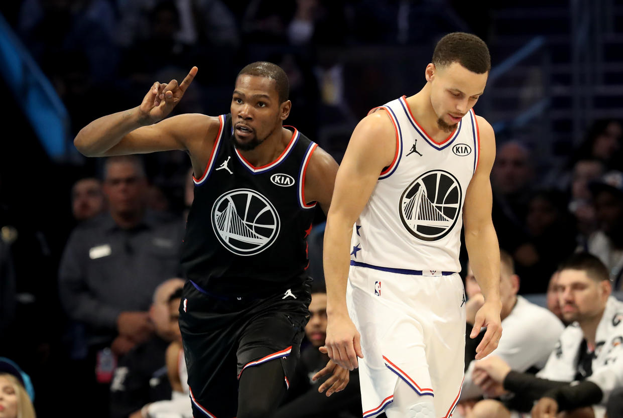 Kevin Durant and Stephen Curry will face each other as foes for the first time since Durant's exit from the Golden State Warriors. (Streeter Lecka/Getty Images)