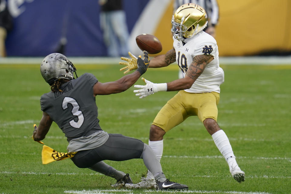 Pittsburgh defensive back Damar Hamlin (3) breaks up a pass to Notre Dame wide receiver Joe Wilkins Jr. (18) during the first half of an NCAA college football game, Saturday, Oct. 24, 2020, in Pittsburgh. (AP Photo/Keith Srakocic)