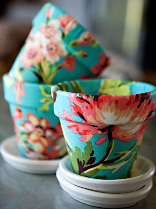 <p>If you gifted bulbs last year, add the perfect container this time around. Floral prints on the bottom only add to the natural beauty up top. </p><p><em><a href="http://www.shelterness.com/how-to-decorate-terracotta-pots-using-fabric/" rel="nofollow noopener" target="_blank" data-ylk="slk:Get the tutorial at Shelterness »;elm:context_link;itc:0;sec:content-canvas" class="link ">Get the tutorial at Shelterness »</a></em><br></p>