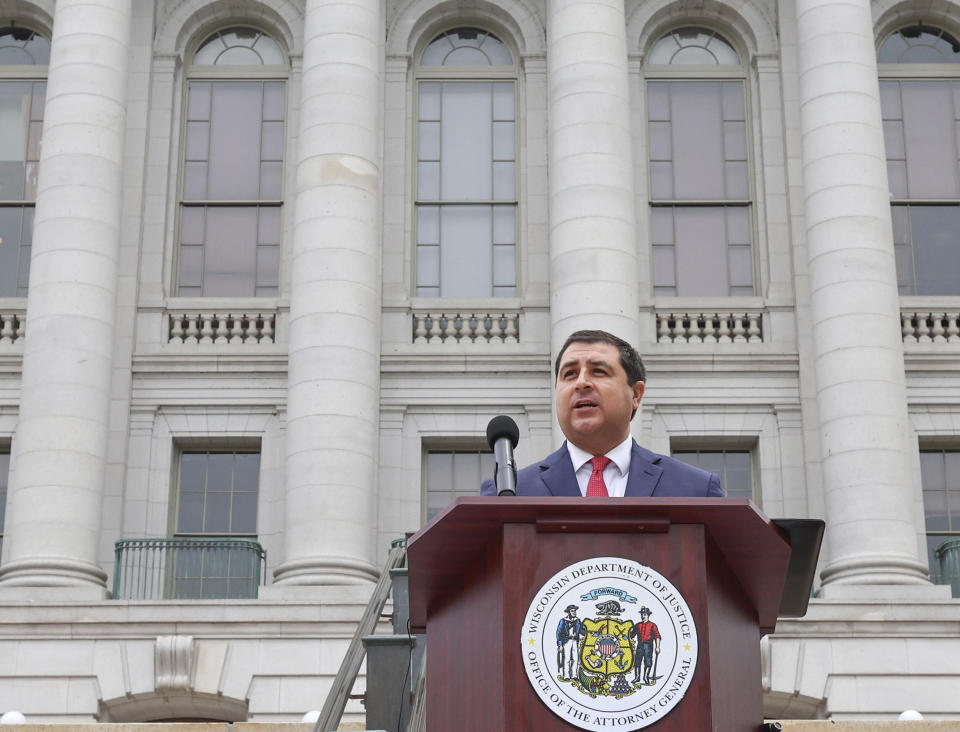 Wisconsin Attorney General Josh Kaul holds a news conference outside the Wisconsin State Capitol building in Madison, Wis. Tuesday, June 4, 2024. Kaul filed felony forgery charges Tuesday against two attorneys and an aide who helped submit paperwork falsely saying that former President Donald Trump had won the battleground state in 2020. (John Hart/Wisconsin State Journal via AP)