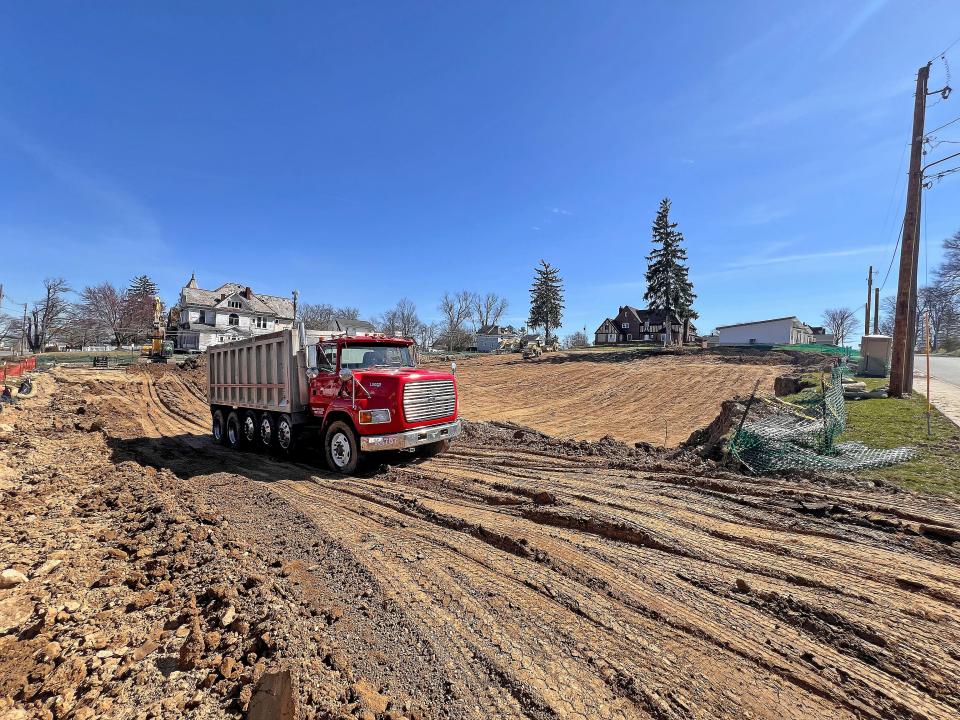 A truckload of dirt is removed from the former YMCA location on Park Avenue West on Thursday afternoon.